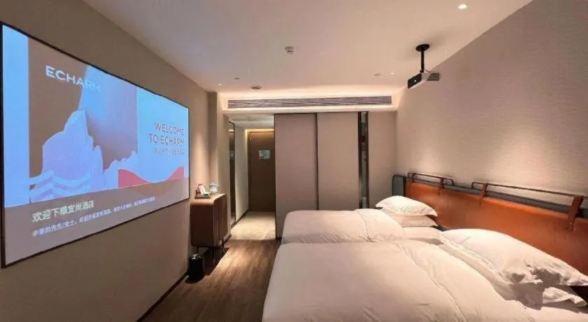 Bed in Echarm Hotel Changsha Huanghua Airport