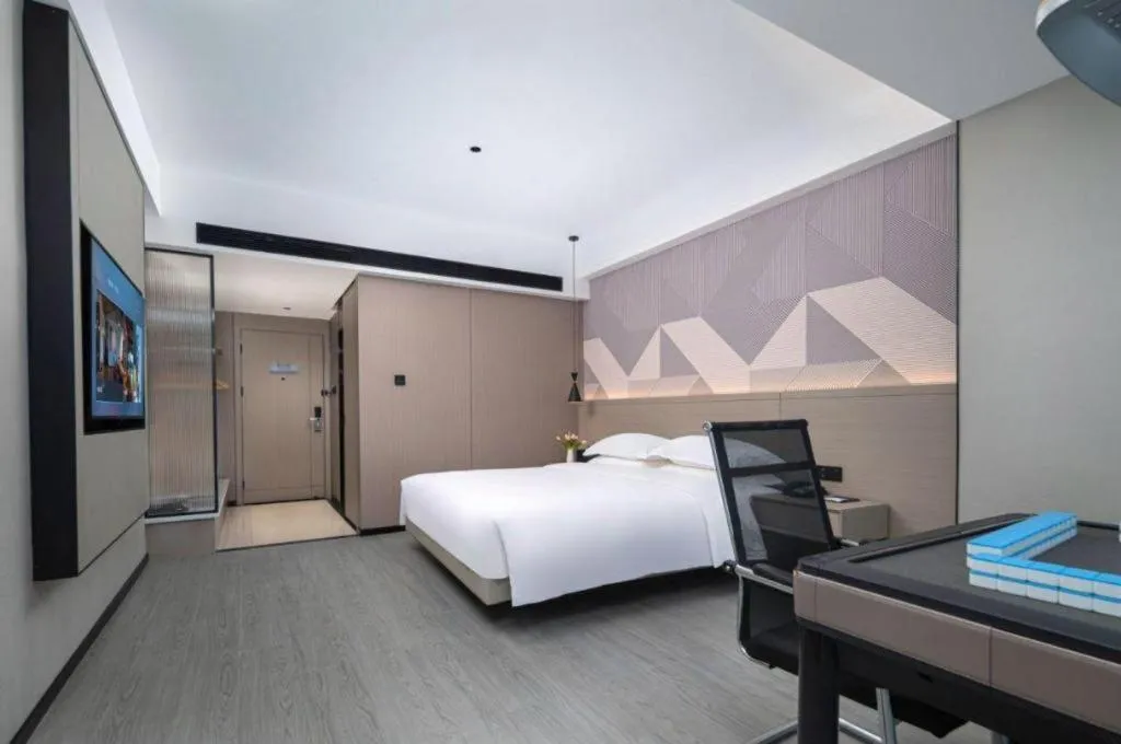 Bed in Borrman Hotel Yongzhou Lingling Ancient Town Government