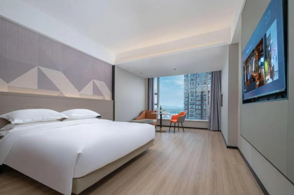 Bed in Borrman Hotel Yongzhou Lingling Ancient Town Government