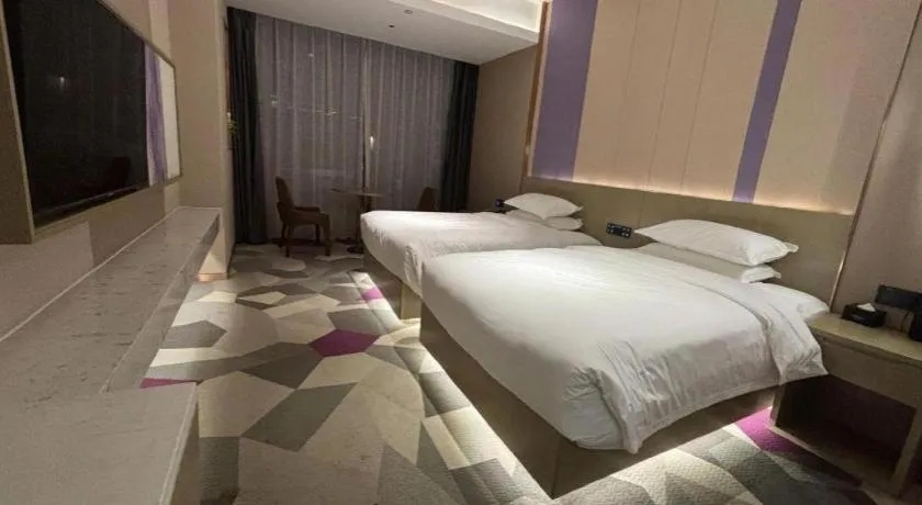 Bed in Borrman Hotel Yongzhou Lingling Ancient Town Government