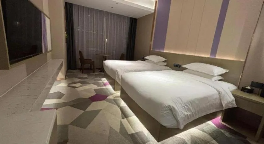 Bed in Borrman Hotel Yongzhou Lingling Ancient Town Government