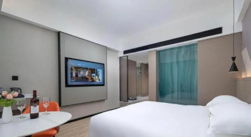 Bed in Borrman Hotel Yongzhou Lingling Ancient Town Government