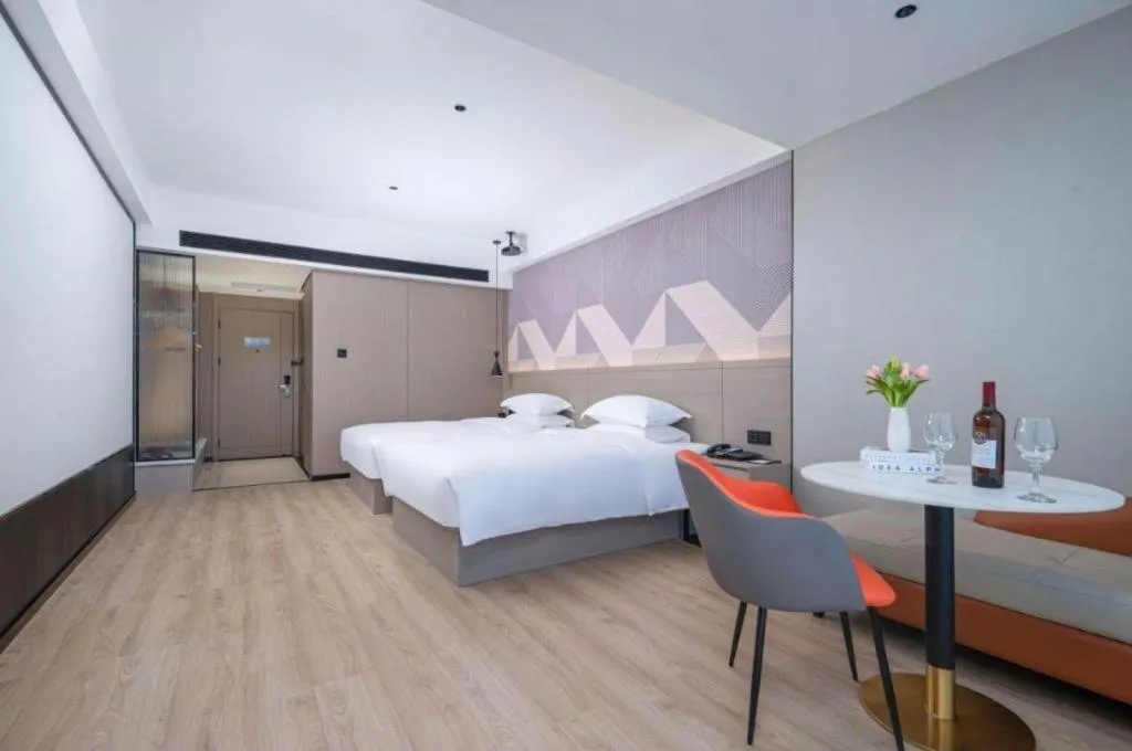 Bed in Borrman Hotel Yongzhou Lingling Ancient Town Government