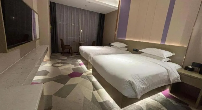 Bed in Borrman Hotel Yongzhou Lingling Ancient Town Government