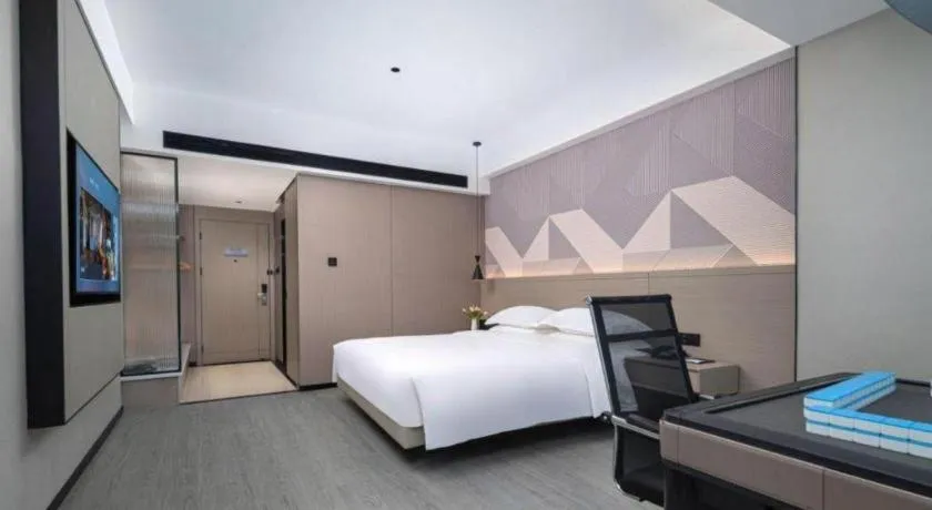 Bed in Borrman Hotel Yongzhou Lingling Ancient Town Government