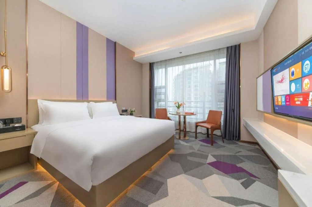 Bed in Borrman Hotel Yongzhou Lingling Ancient Town Government