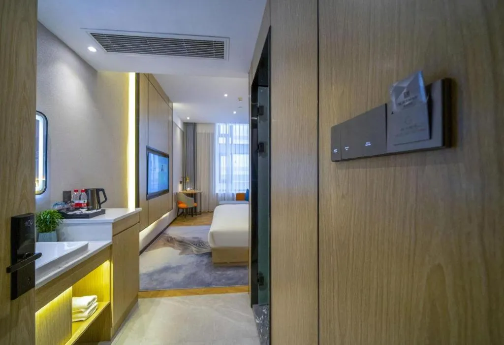 Bed in Borrman Hotel Zhangzhou Baolong Plaza