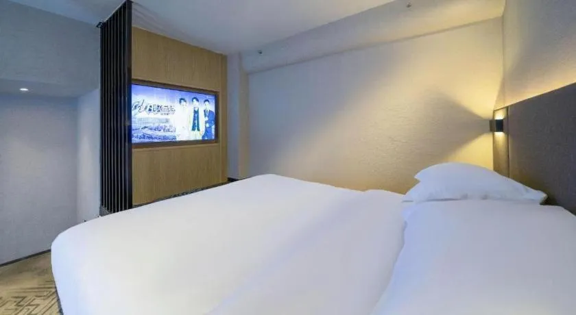 Bed in Borrman Hotel Zhangzhou Baolong Plaza
