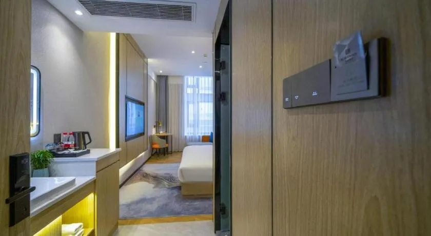 Bed in Borrman Hotel Zhangzhou Baolong Plaza