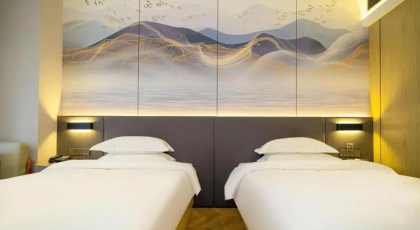 Bed in Borrman Hotel Zhangzhou Baolong Plaza