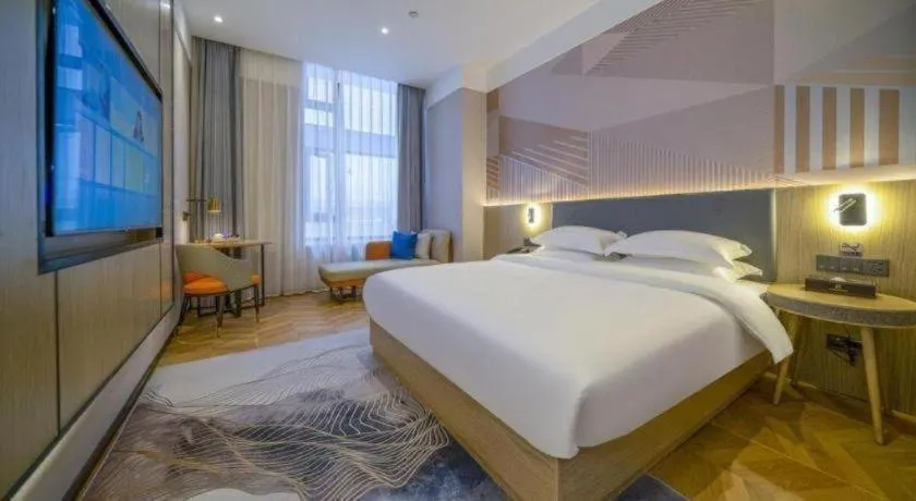 Bed in Borrman Hotel Zhangzhou Baolong Plaza