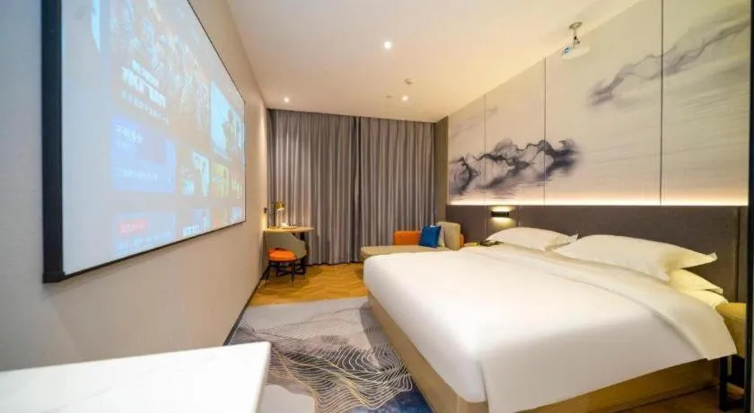 Bed in Borrman Hotel Zhangzhou Baolong Plaza