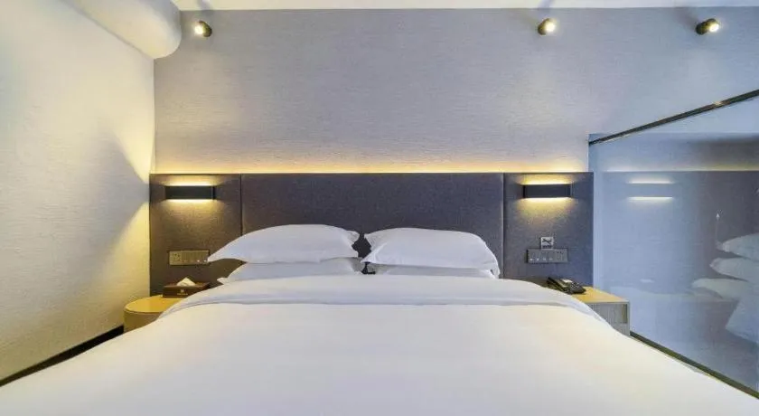 Bed in Borrman Hotel Zhangzhou Baolong Plaza