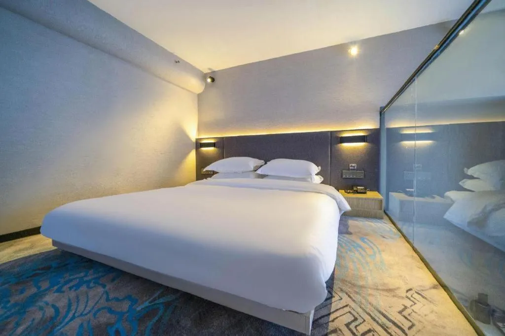 Bed in Borrman Hotel Zhangzhou Baolong Plaza