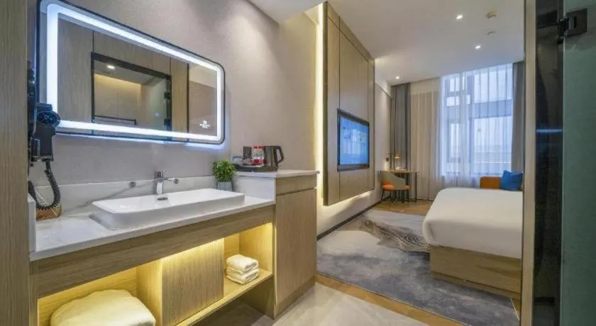 Bed in Borrman Hotel Zhangzhou Baolong Plaza