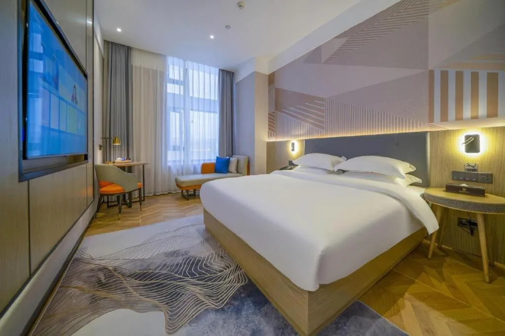 Bed in Borrman Hotel Zhangzhou Baolong Plaza