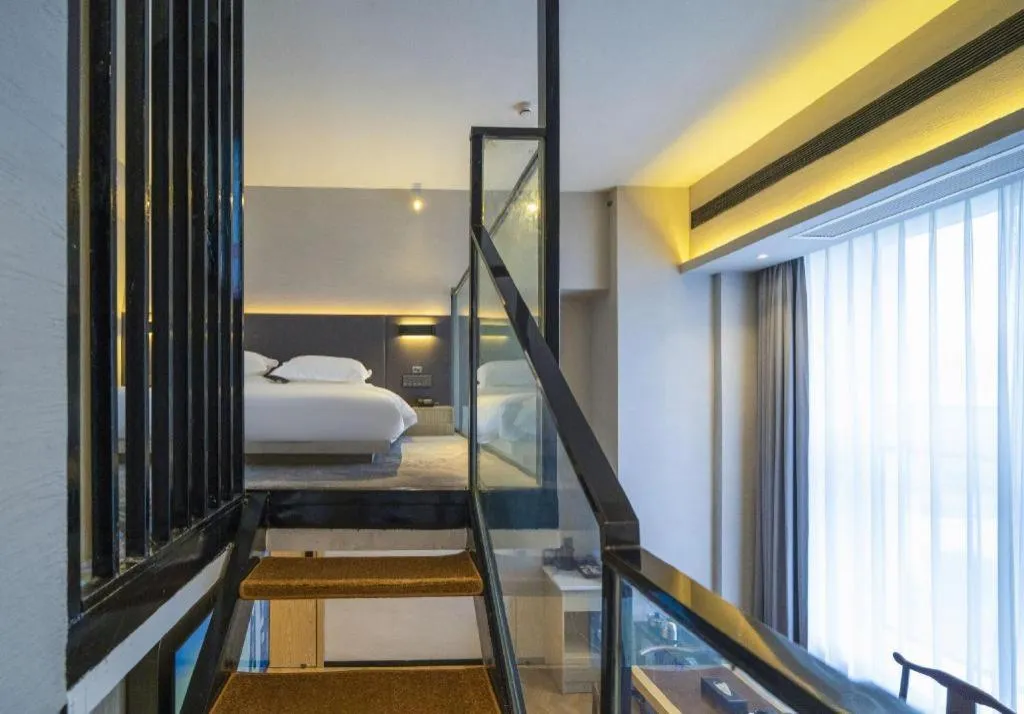 Bed in Borrman Hotel Zhangzhou Baolong Plaza