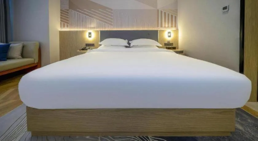 Bed in Borrman Hotel Zhangzhou Baolong Plaza