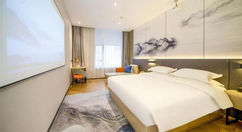 Bed in Borrman Hotel Zhangzhou Baolong Plaza