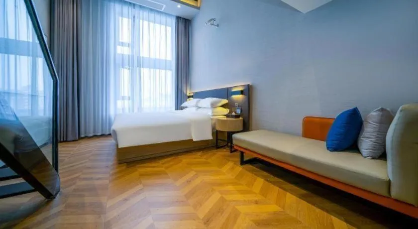 Bed in Borrman Hotel Zhangzhou Baolong Plaza