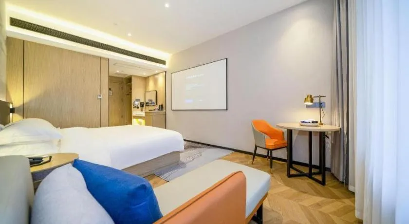 Bed in Borrman Hotel Zhangzhou Baolong Plaza