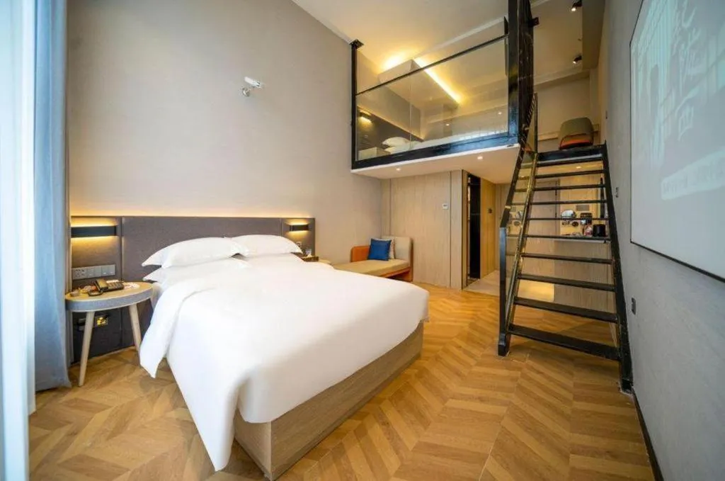 Bed in Borrman Hotel Zhangzhou Baolong Plaza