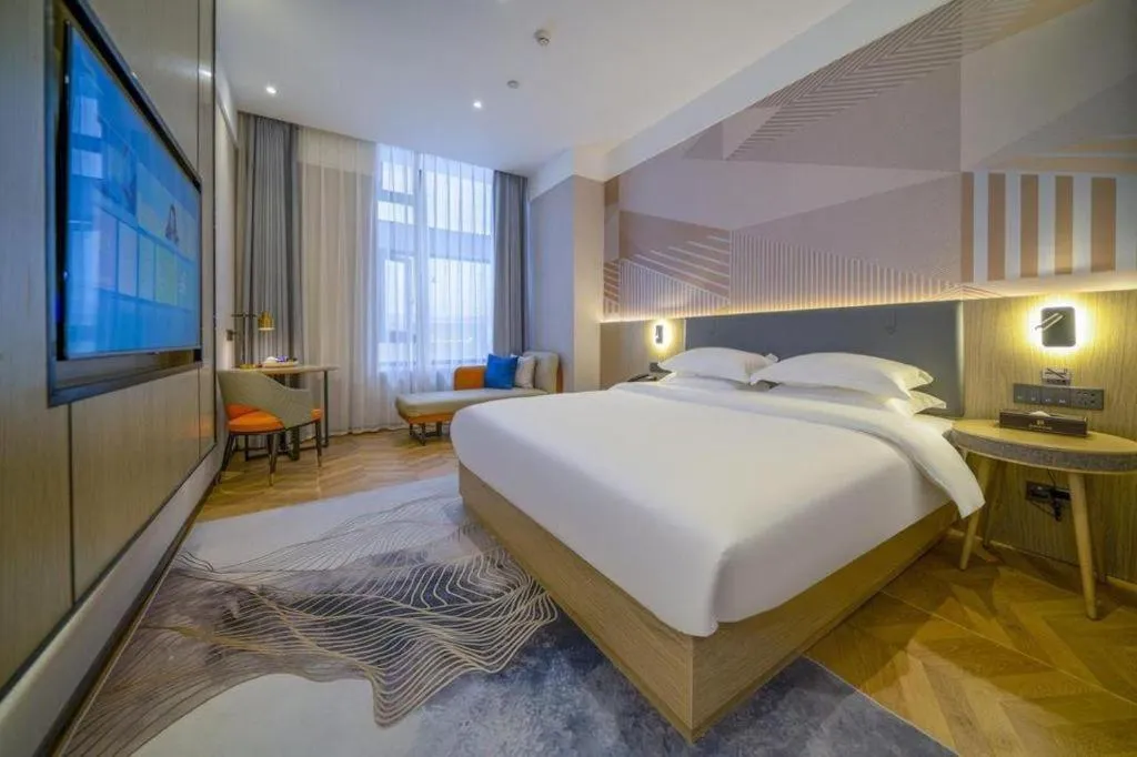 Bed in Borrman Hotel Zhangzhou Baolong Plaza