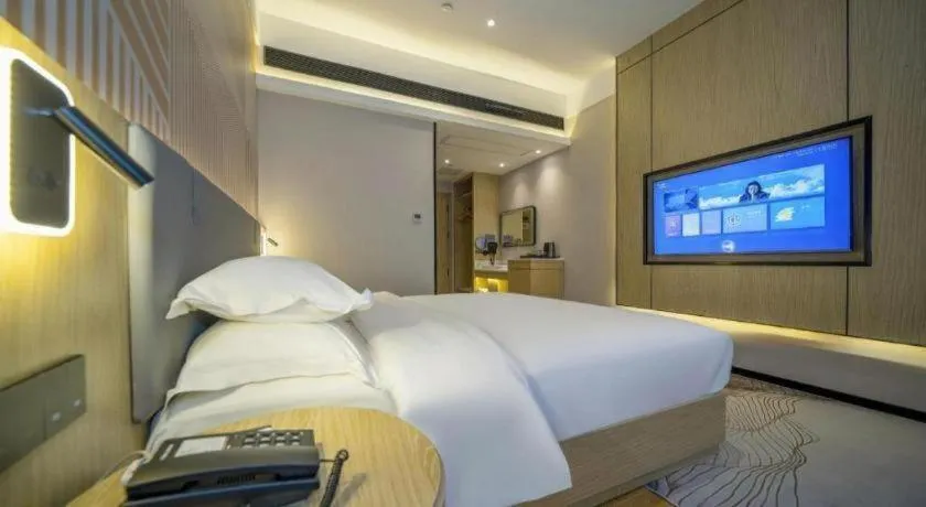 Bed in Borrman Hotel Zhangzhou Baolong Plaza