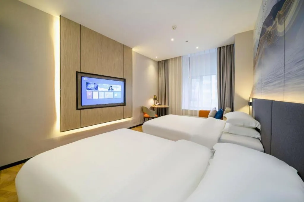 Bed in Borrman Hotel Zhangzhou Baolong Plaza