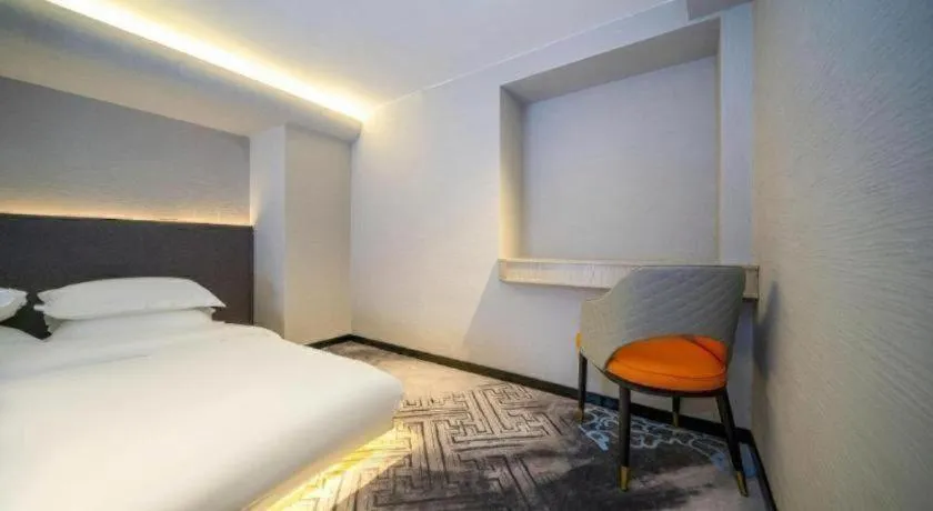 Bed in Borrman Hotel Zhangzhou Baolong Plaza