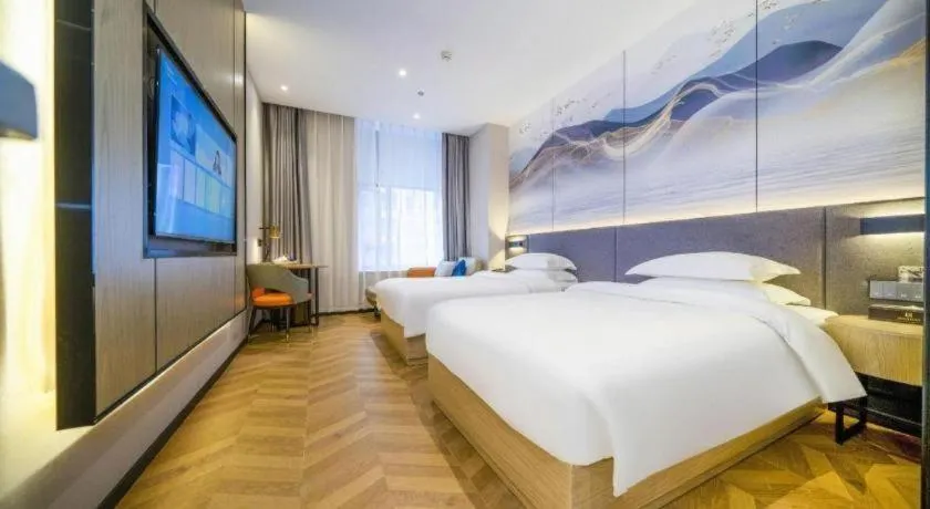 Bed in Borrman Hotel Zhangzhou Baolong Plaza