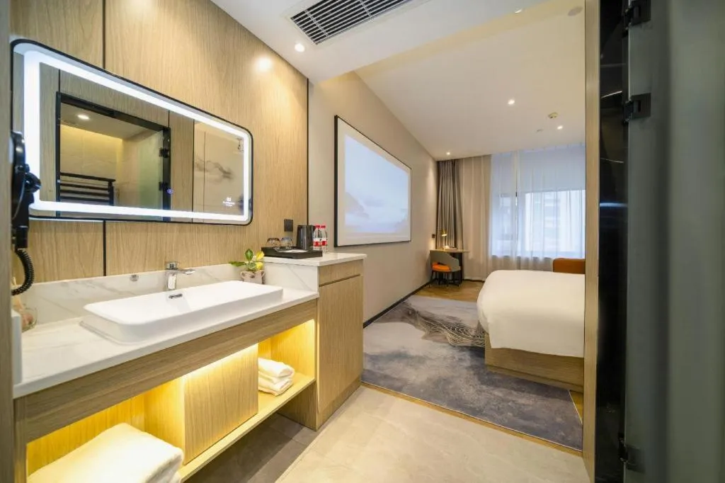 Bed in Borrman Hotel Zhangzhou Baolong Plaza