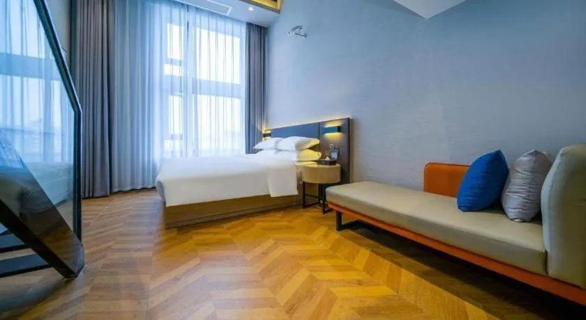 Bed in Borrman Hotel Zhangzhou Baolong Plaza