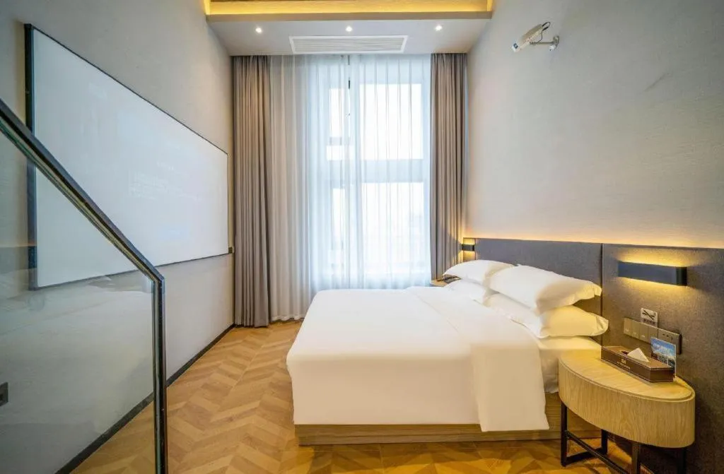 Bed in Borrman Hotel Zhangzhou Baolong Plaza