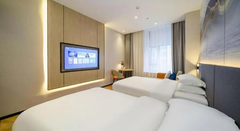 Bed in Borrman Hotel Zhangzhou Baolong Plaza