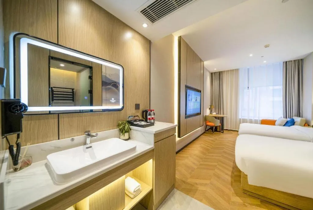 Bed in Borrman Hotel Zhangzhou Baolong Plaza