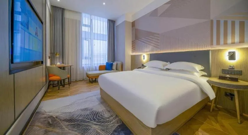 Bed in Borrman Hotel Zhangzhou Baolong Plaza