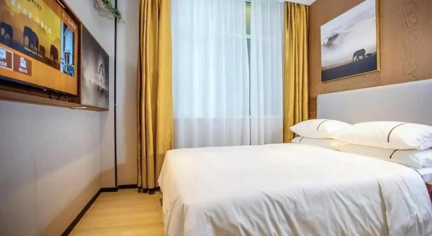 Bed in JTOUR Inn Wuhan Textile University