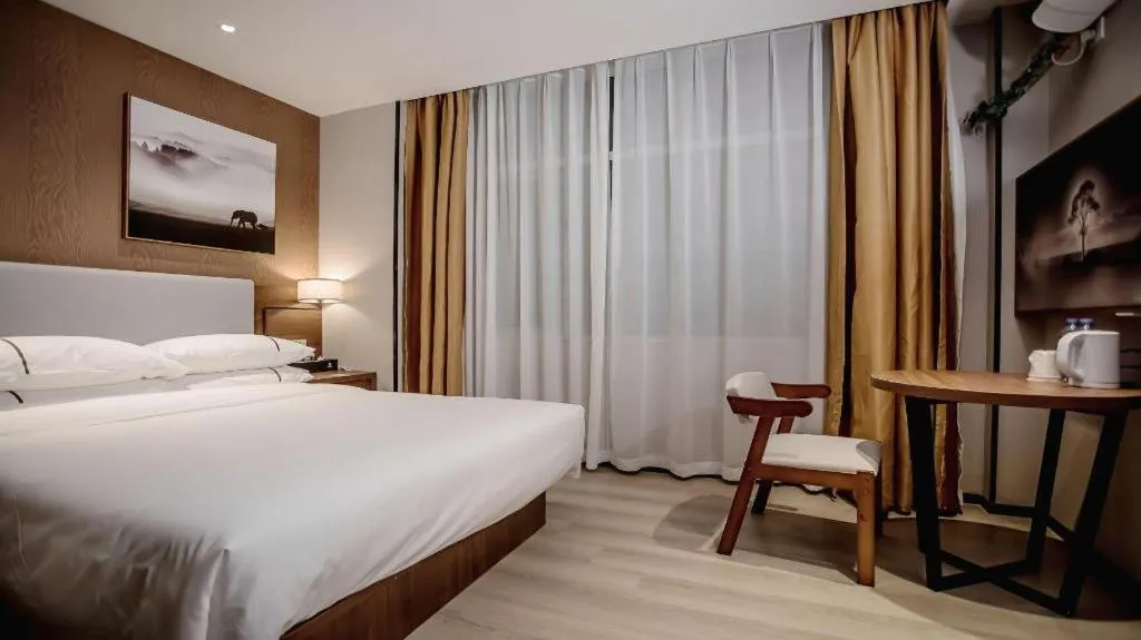 Bed in JTOUR Inn Wuhan Textile University