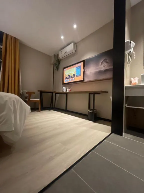 Bed in JTOUR Inn Wuhan Textile University