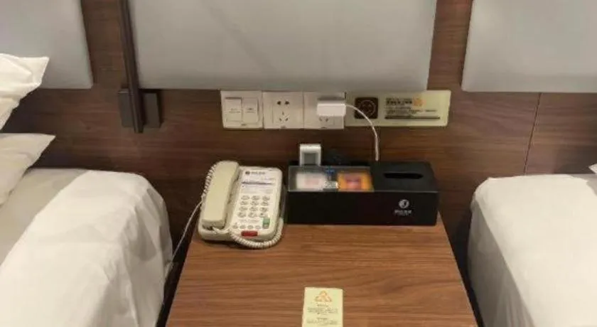 Bed in JTOUR Inn Wuhan Textile University