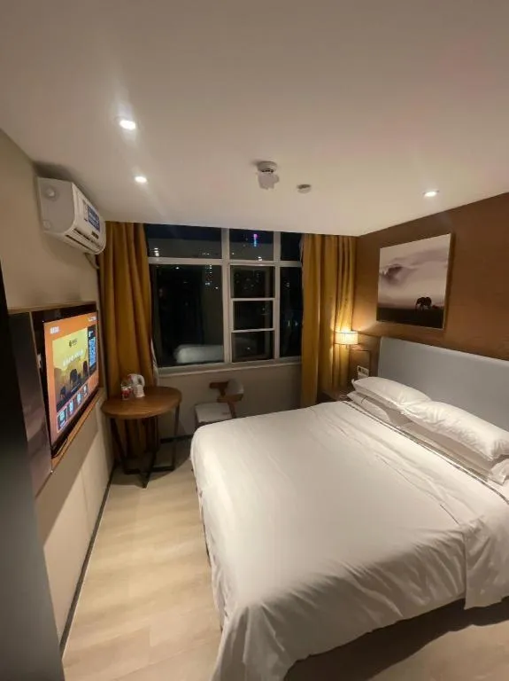 Bed in JTOUR Inn Wuhan Textile University