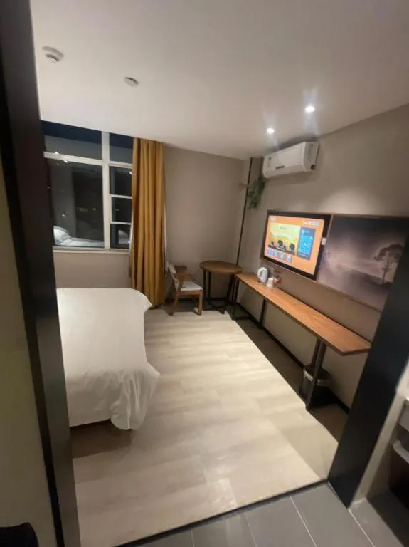 Bed in JTOUR Inn Wuhan Textile University