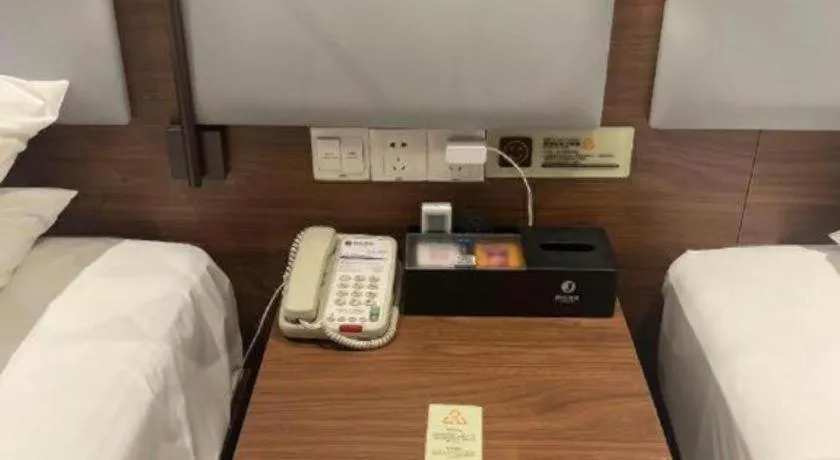 Bed in JTOUR Inn Wuhan Textile University