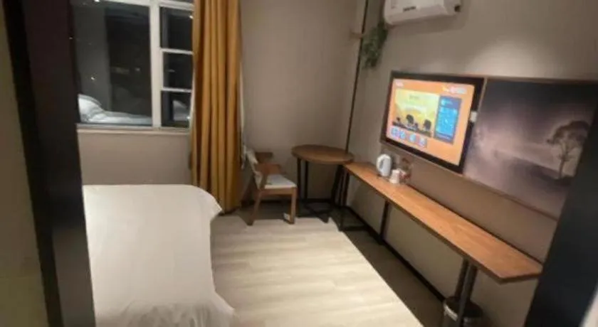Bed in JTOUR Inn Wuhan Textile University