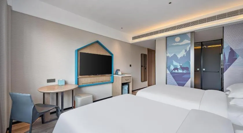Bed in Echarm Hotel Xi'an Bell Tower Huimin Street