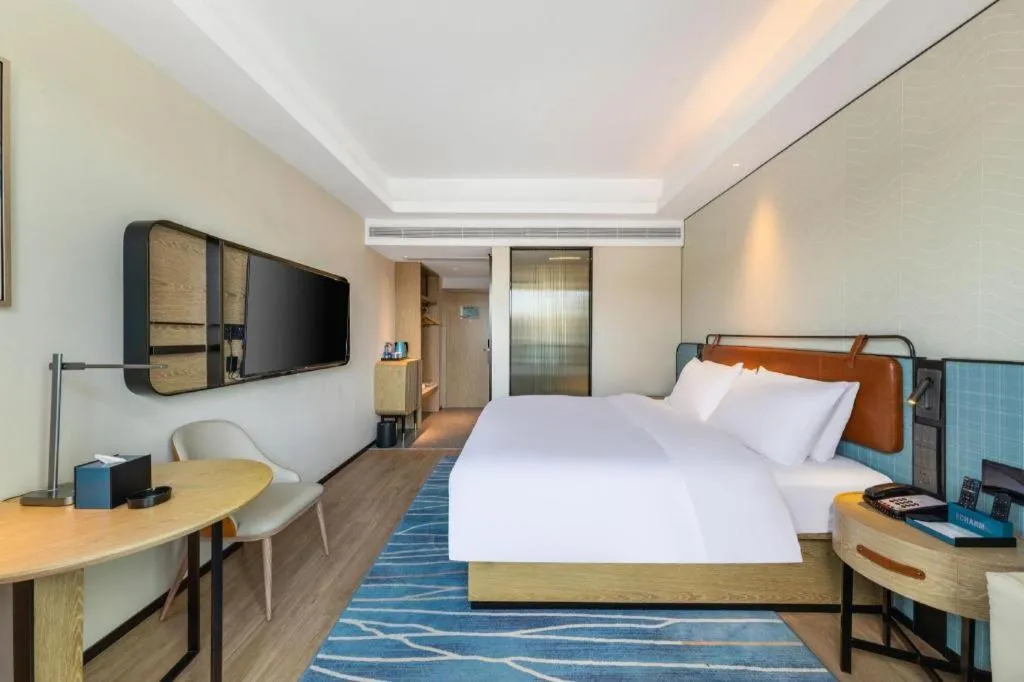 Bed in Echarm Hotel Guangzhou South Railway Station