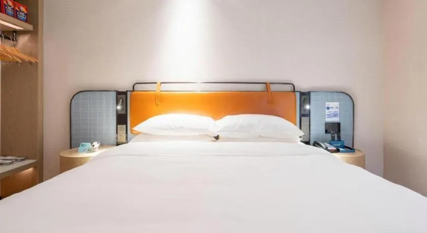 Bed in Echarm Hotel Guangzhou South Railway Station