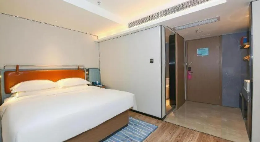 Bed in Echarm Hotel Guangzhou South Railway Station