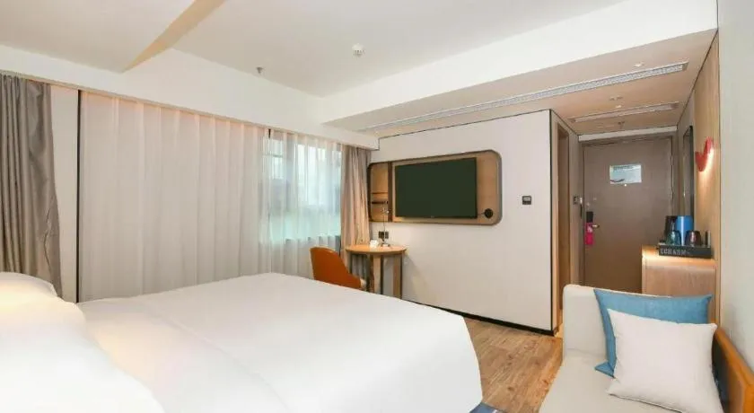 Bed in Echarm Hotel Guangzhou South Railway Station